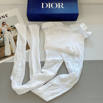 CD fishnet stockings with big D letter