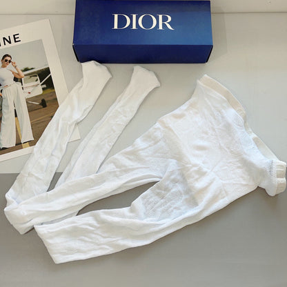 CD fishnet stockings with big D letter