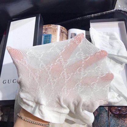 Guc One-piece fishnet pants