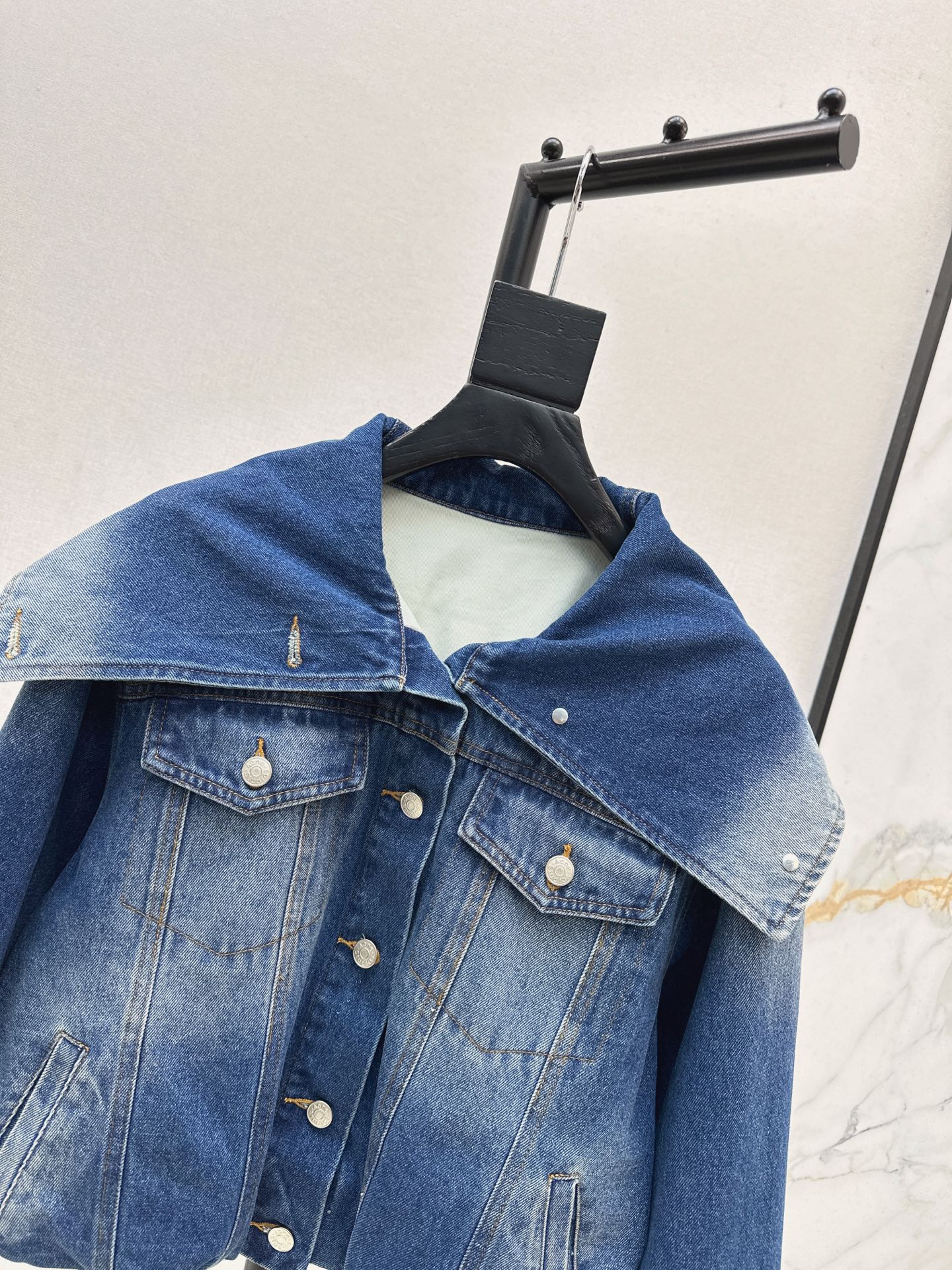 An NEW denim jacket
