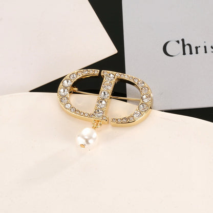 CD New Alphabet brooch