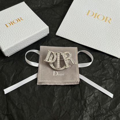 CD New Alphabet brooch