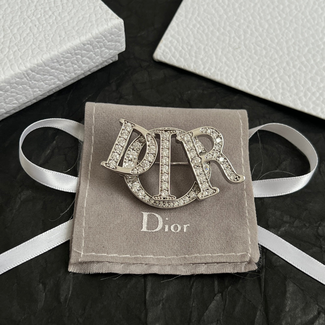 CD New Alphabet brooch
